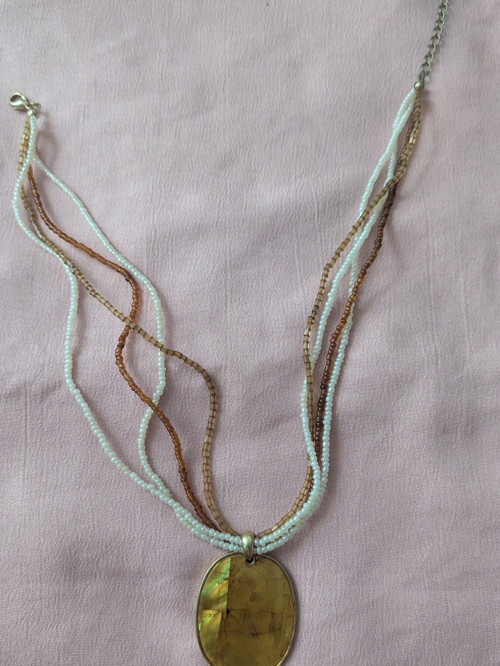 Multi-Strand White and Brown Beaded Necklace with Gold Pendant